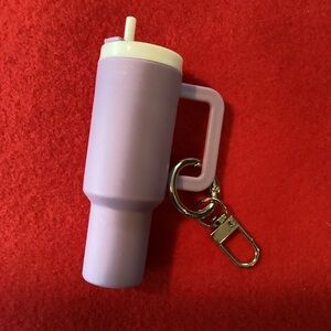 Boutique: Mini Purple Keychain Accessory lip Balm holder with lip balm.